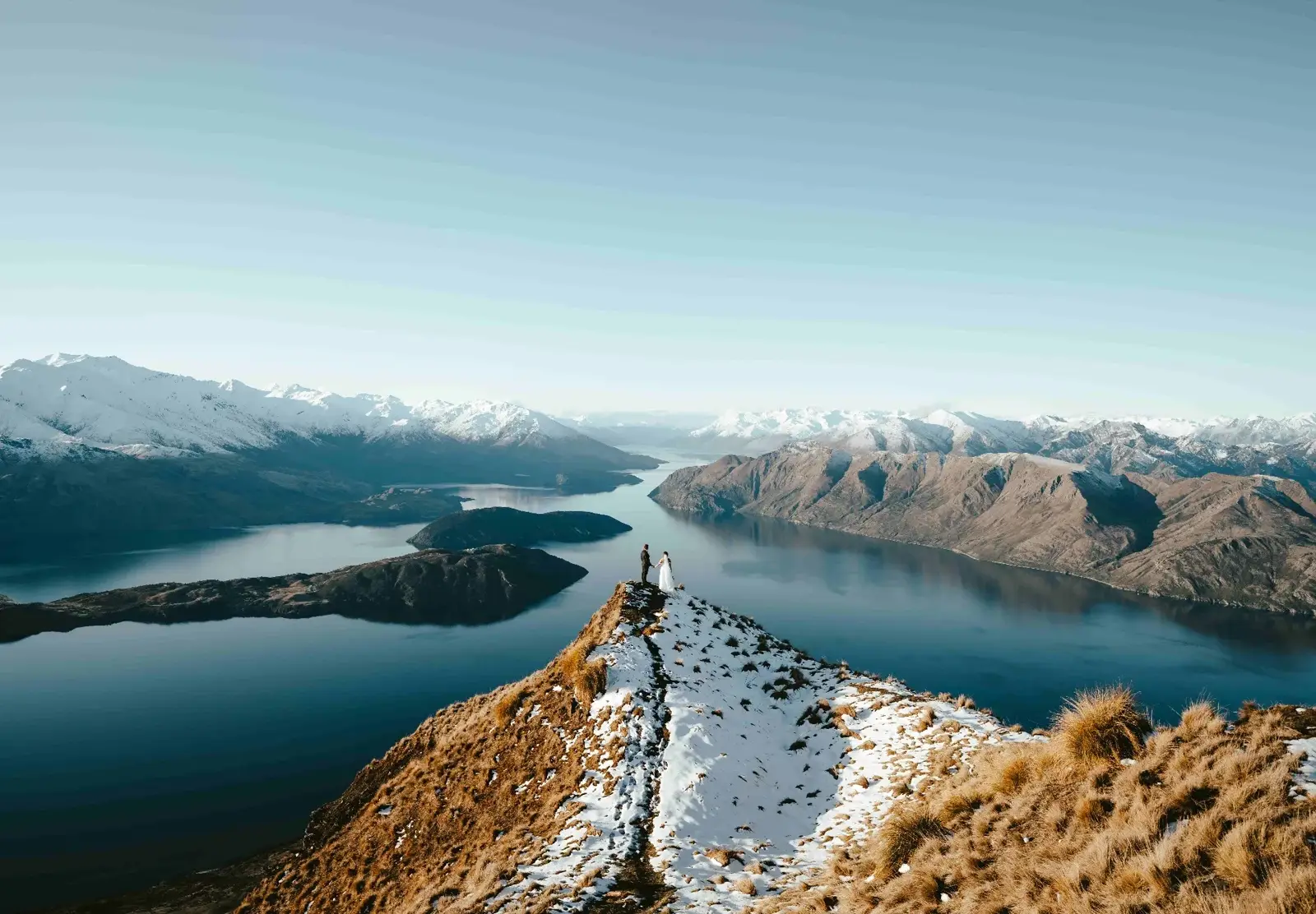 Couple on Coromandel Peak during a winter elopement in Wānaka